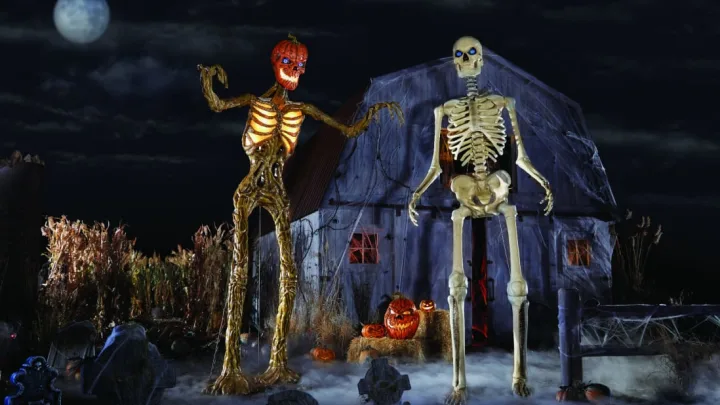 2 12 foot skeletons on display