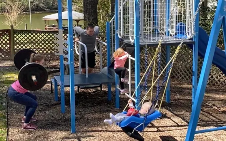 family excercising on a Swingsesh
