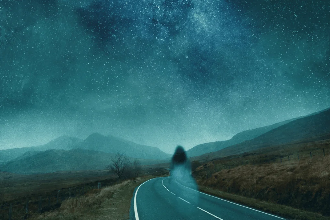 America's Haunted Highways illusion of a girl in white on a rural backroad on a starry night