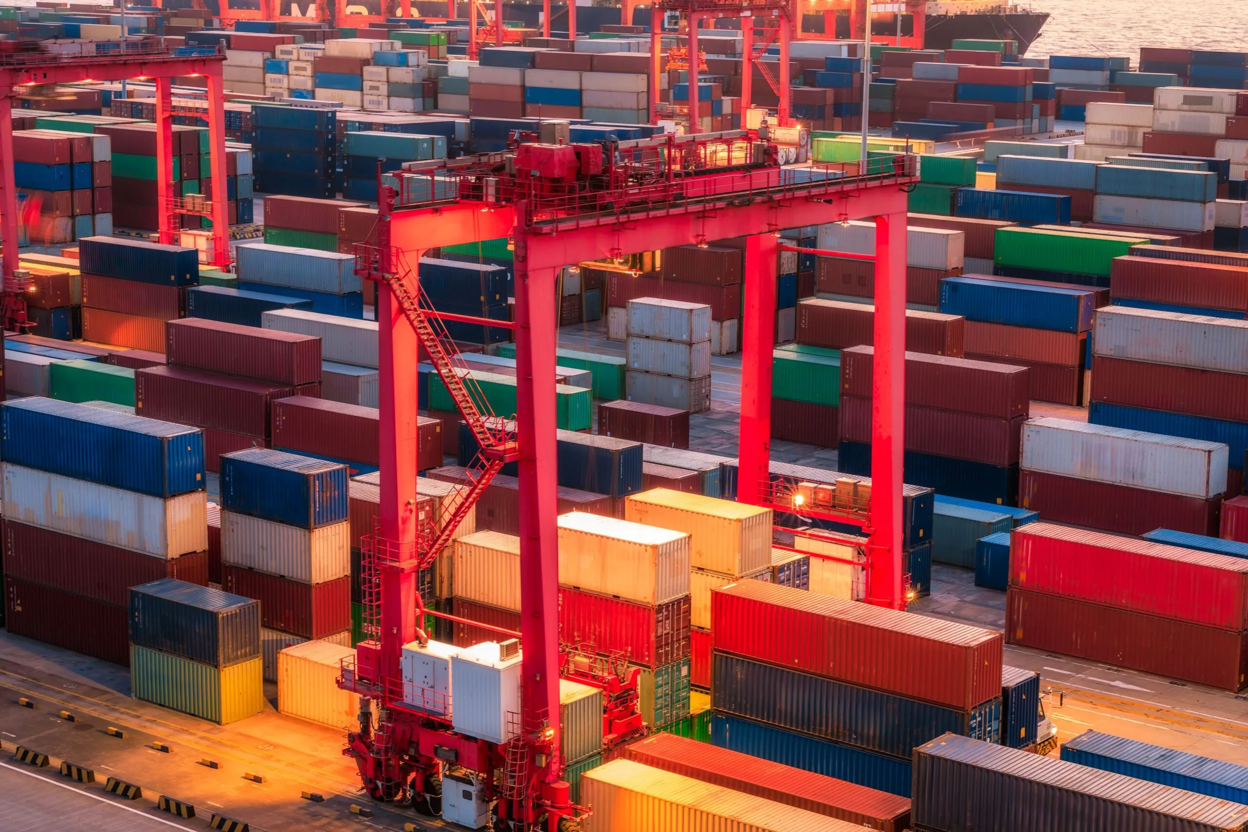 cargo containers stacked at shipping port