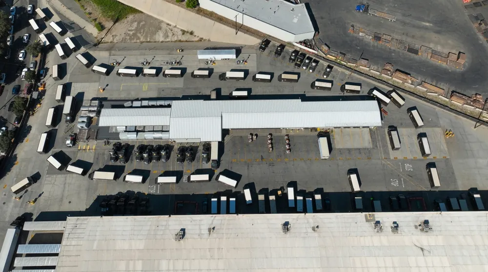 lots of trucks leaving area