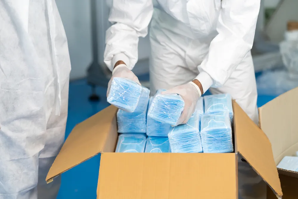 cleaning agents and chemical solvents being packed into a box
