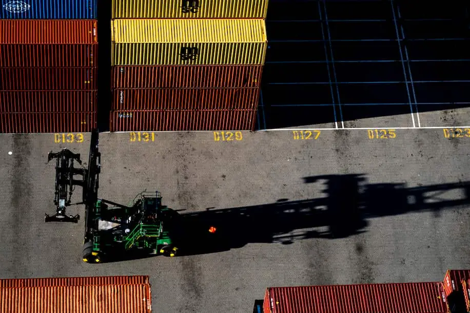 top down view forklift navigating a container port
