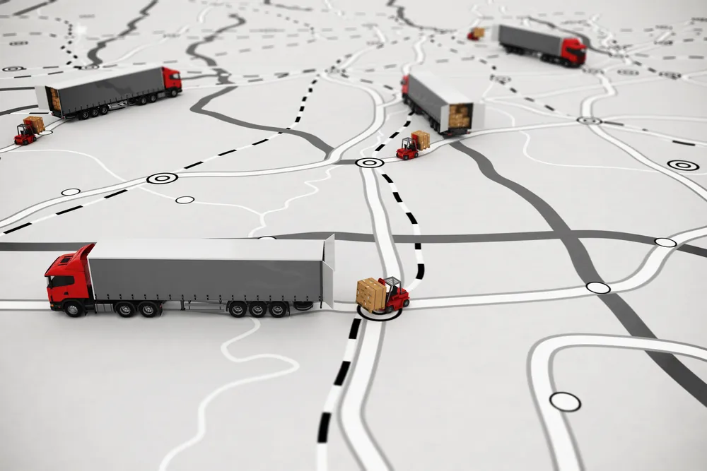 Shipping Pavers red freight trucks on map with forklifts loading trucks FreightCenter