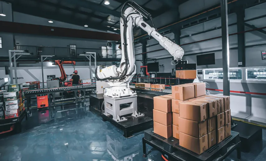 10 foot warehouse robotic arm organizing shipment boxes into the proper section.