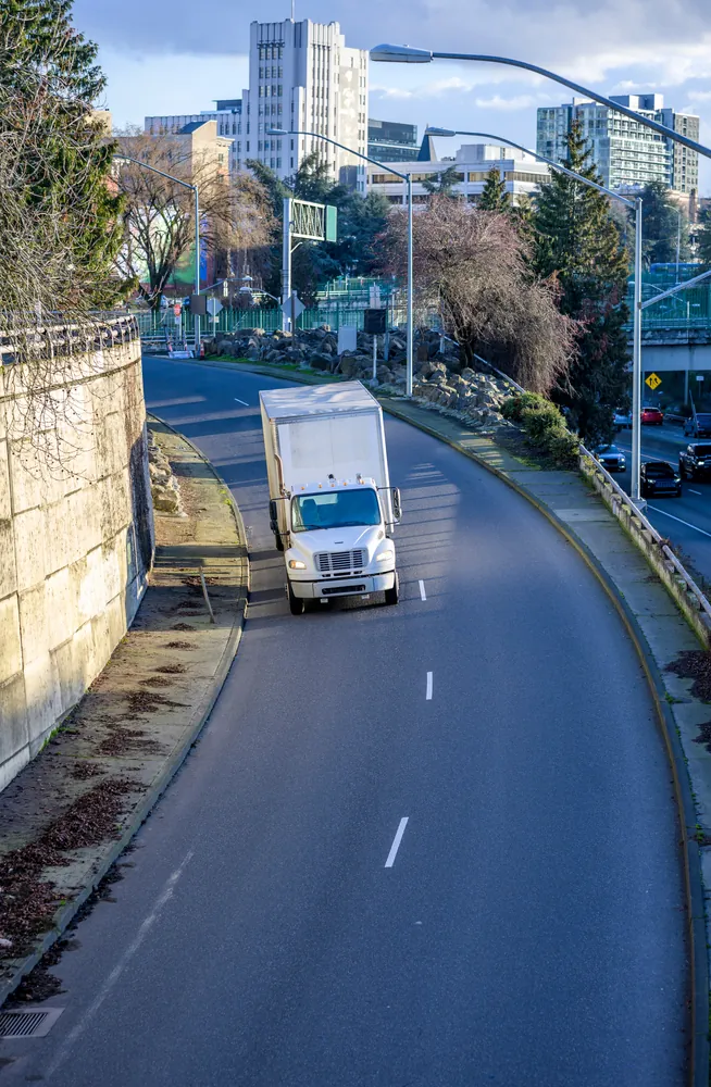 box truck on a winding road