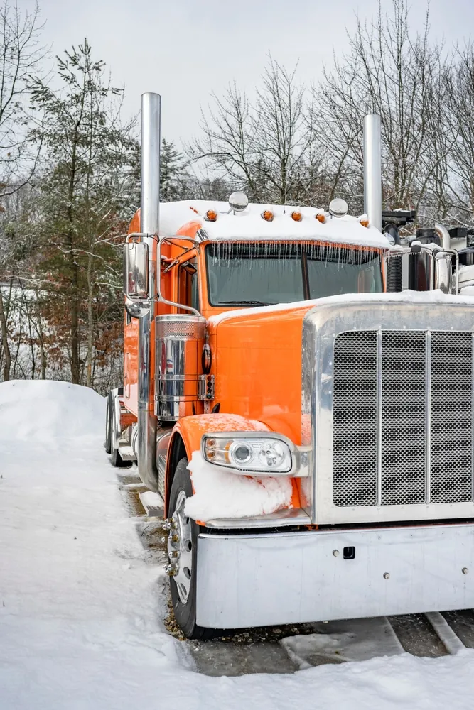 orange truck snow