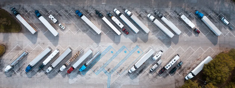 view of semis in a parking lot