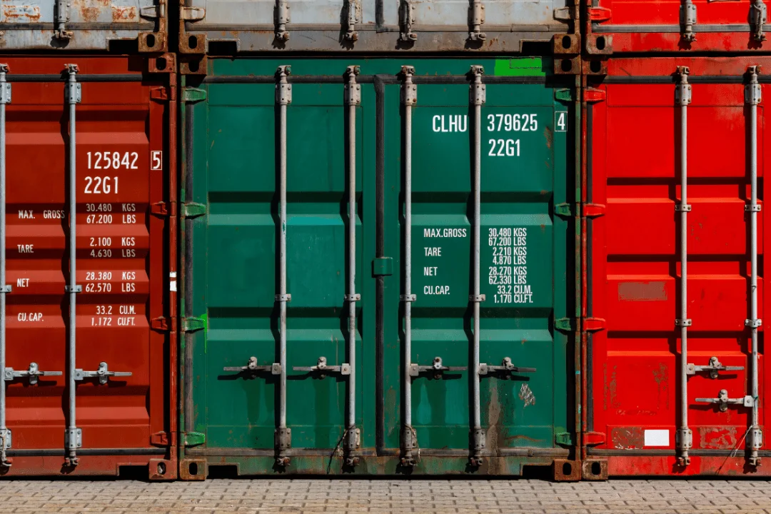 15 Interesting Facts About Shipping Containers front view of stacked shipping containers
