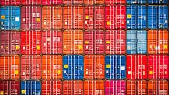 15 Interesting Facts About Shipping Containers rows of stacked colorful shipping containers PREVIEW VERSION