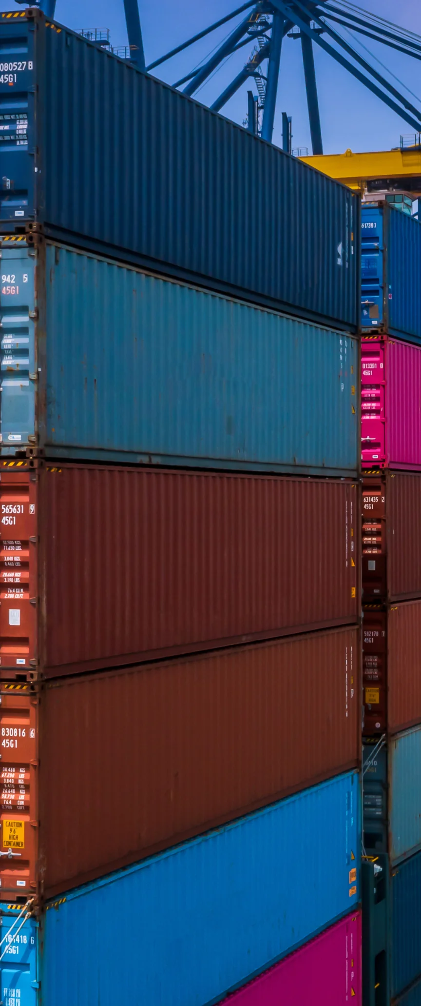 stack of shipping containers at a port