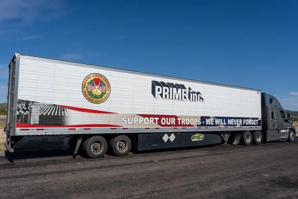 Prime inc. truck and trailer with Wreaths Across America logo and Support our Troops