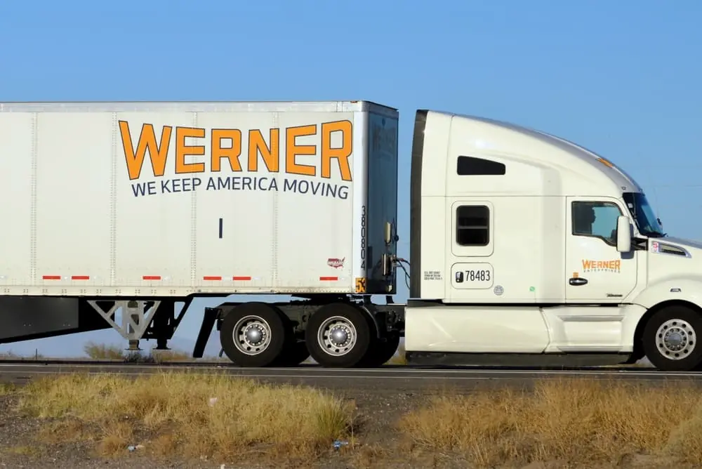 werner enterprises semi truck driving I-10 interstate