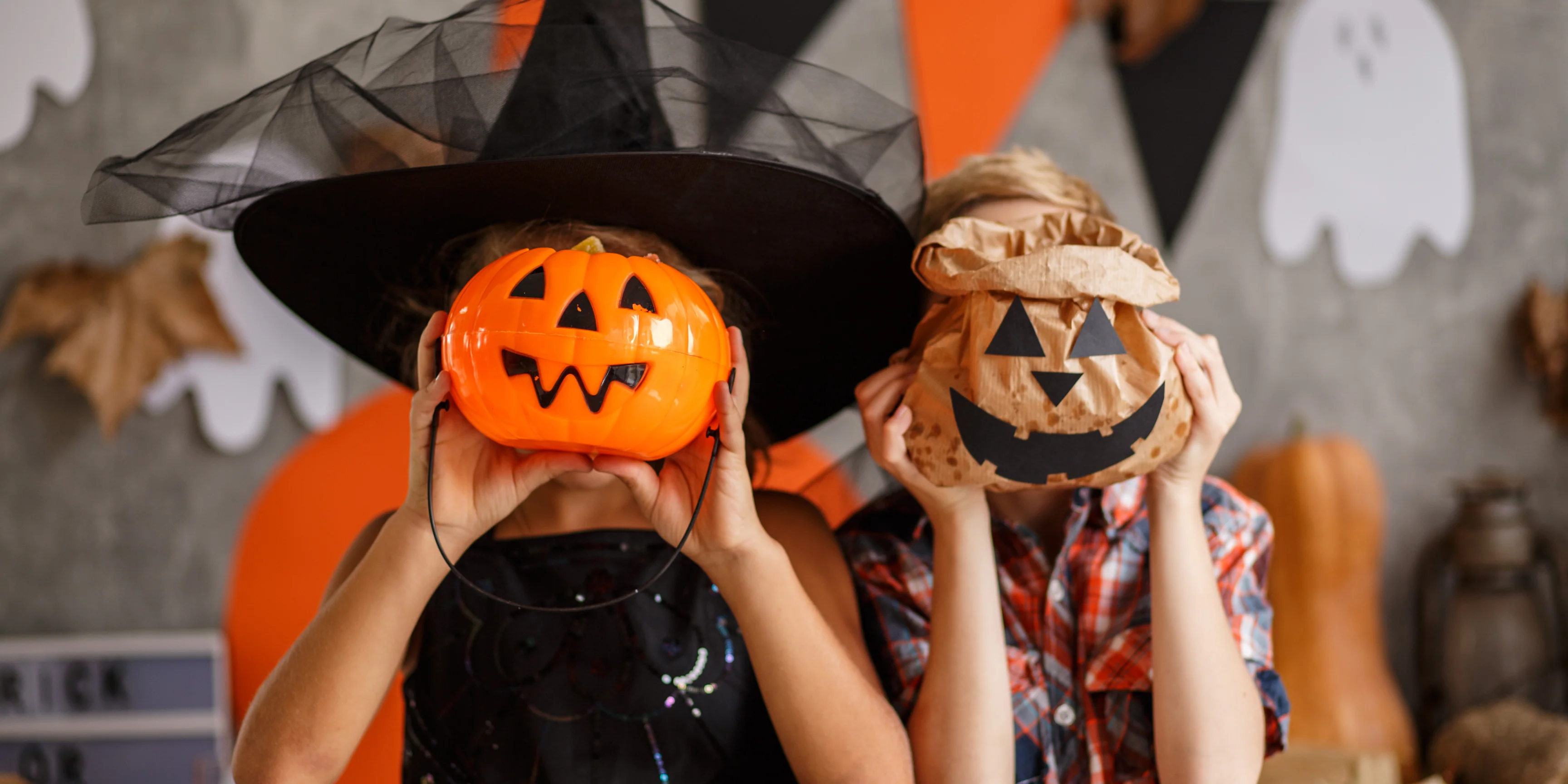 halloween witch costumes and pumpkins