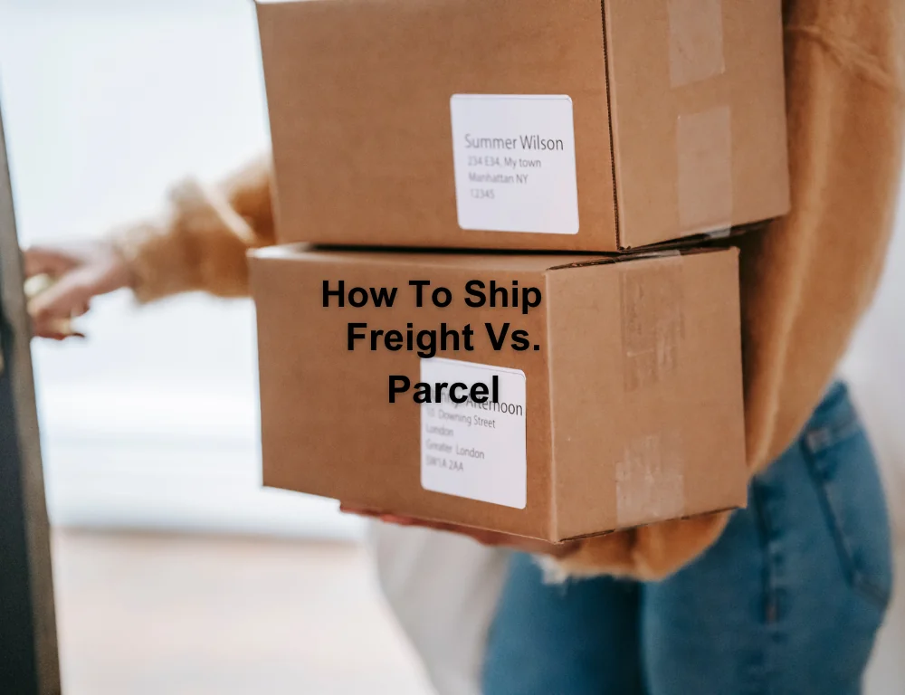 woman holding stacked boxes