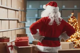 holiday shipping season santa with packages and presents