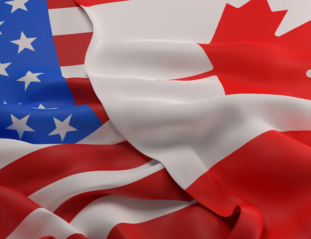 flags of the United States and Canada overlapping