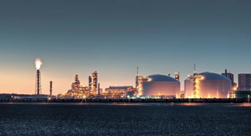 Industry News March 2026 distant view of oil refinery