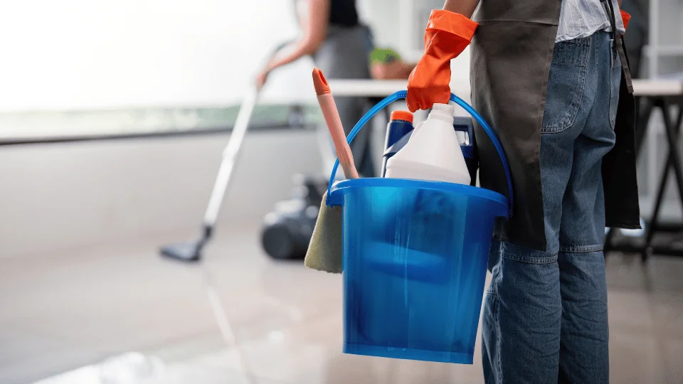 Shipping Cleaning Supplies and Laundry Detergents workers using cleaning products in an office