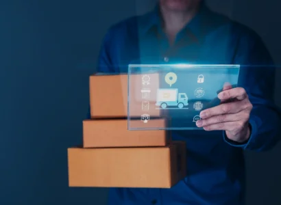 man tracks shipment with tablet