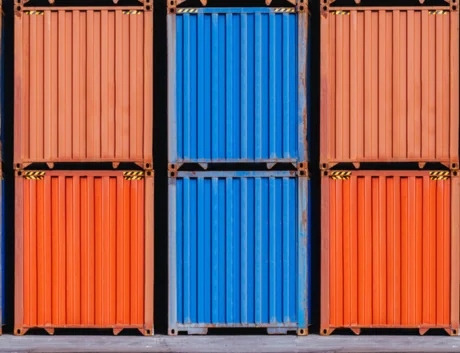 orange and blue stacked cargo containers