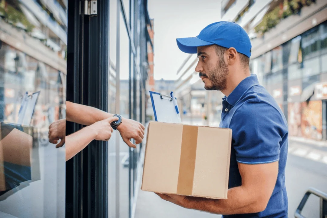 Five Reasons to Use Expedited Freight Shipping delivery person with package getting yelled at person pointing their finger at their watch