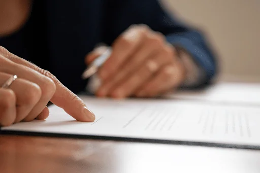 Someone checking a document