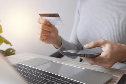 Someone making a credit card payment