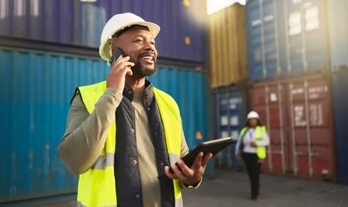 man at container port