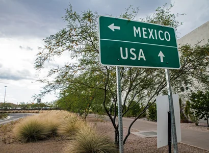 Signpost at the US-Mexican border