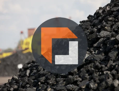 a heap of coal with FreightCenter logo in the center