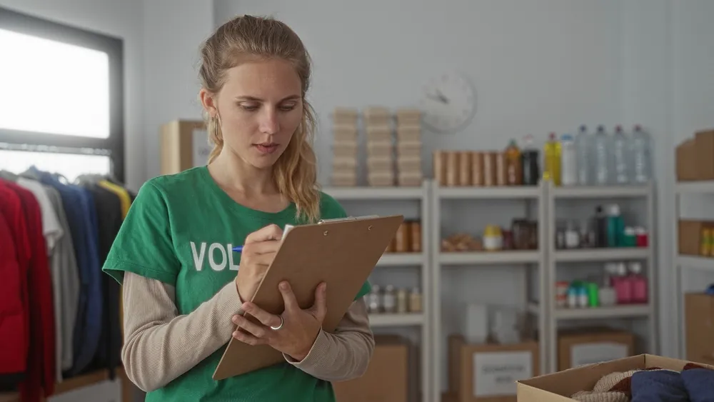 How Freight Moves Donations volunteer with donated goods