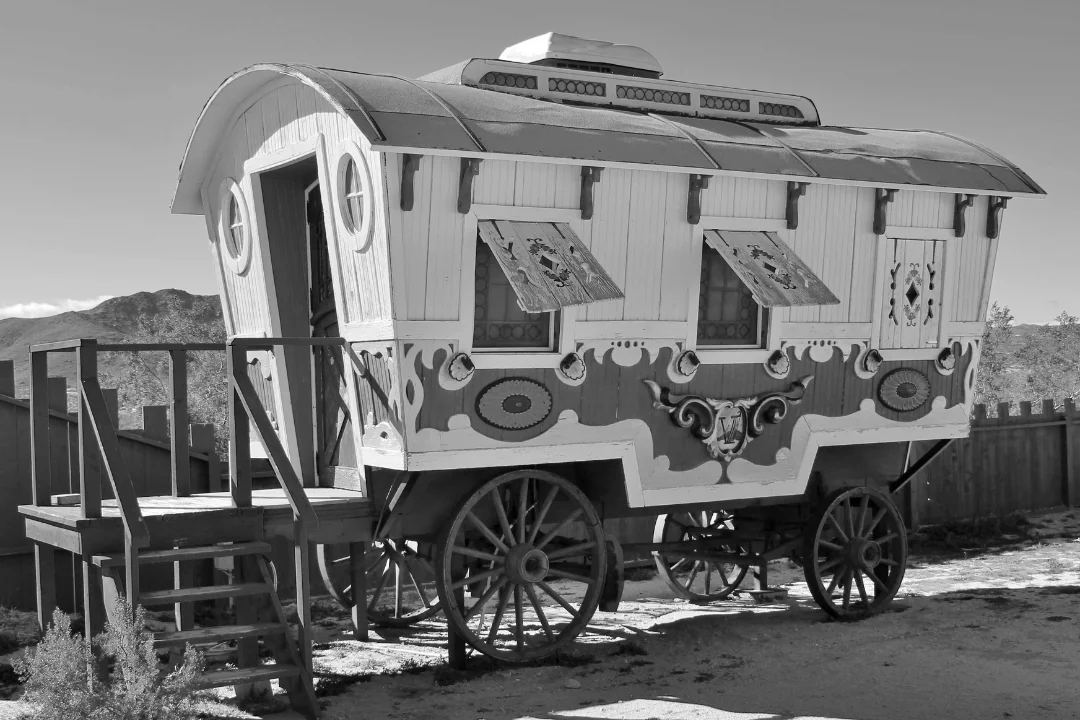 Freight Shipping Circuses exterior view of an old circus trailer parked in the California desert