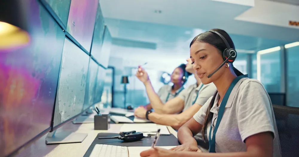 dispatch worker at computer