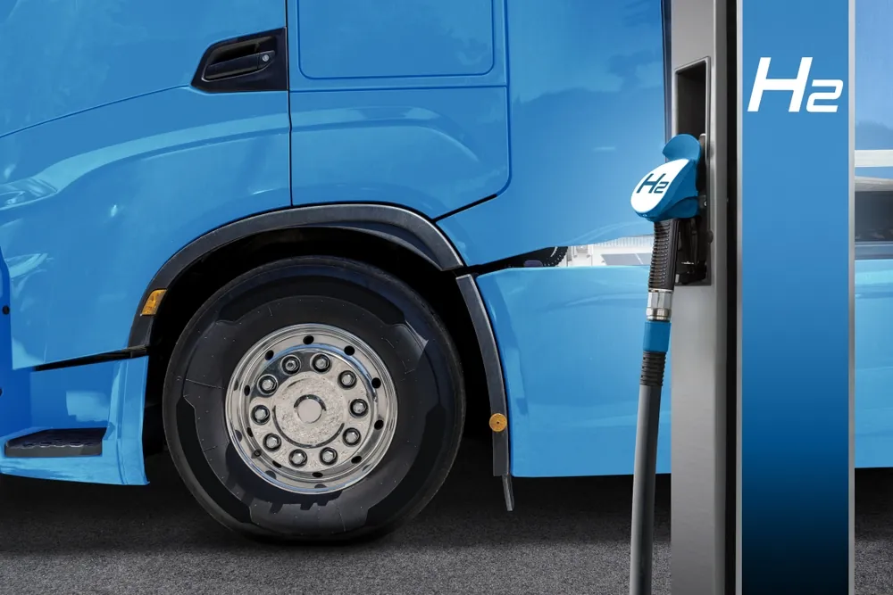 Sustainability Goals for 2026 blue semi truck fueling at a hydrogen fuel station