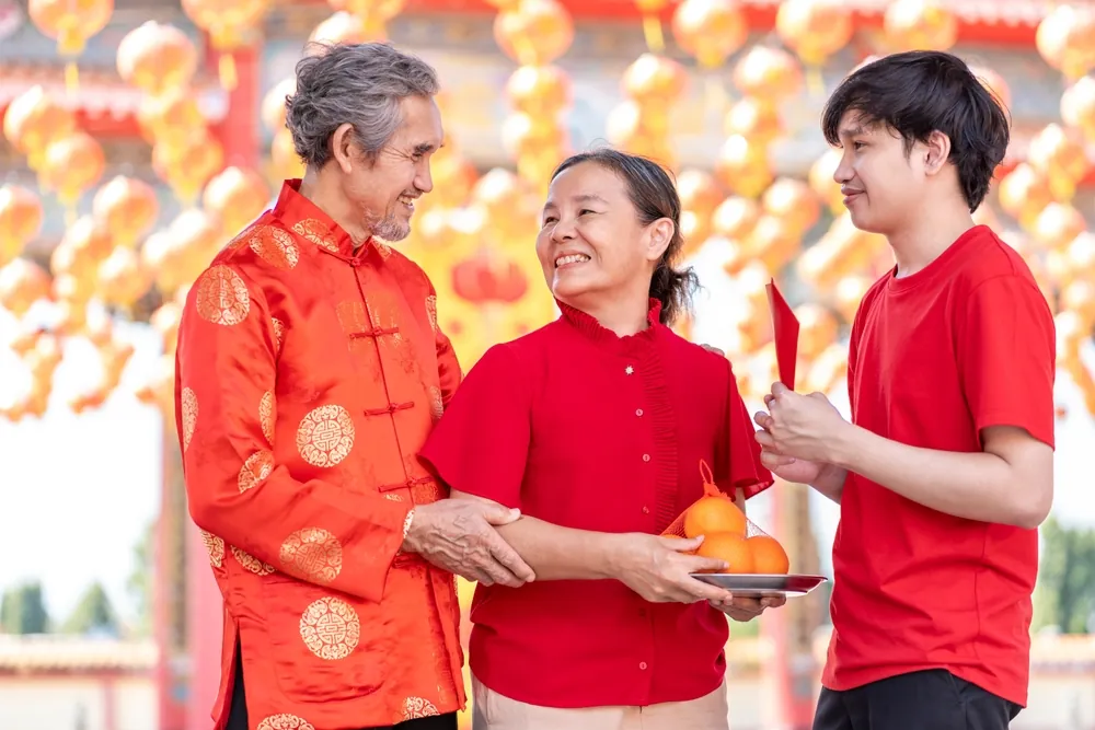 family outside celebrating lunar new year