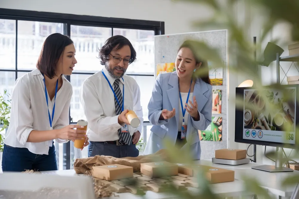workers discussing over packaging materials
