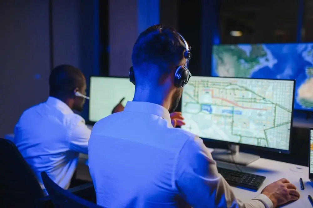 How to Communicate Better in Logistics freight brokers checking Google Maps while booking shipment