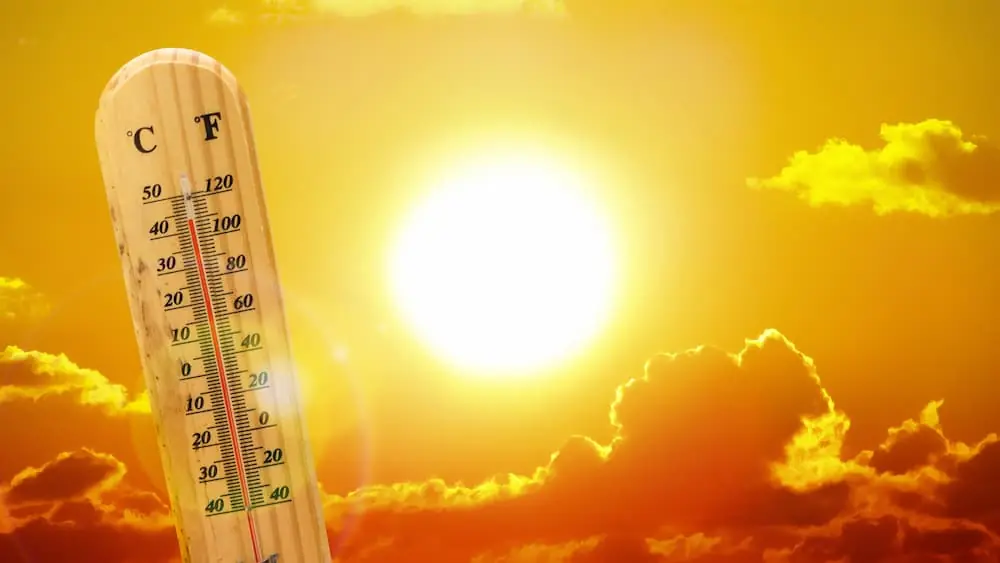 The Climate Forces Reshaping Freight in 2026 thermometer rising as sun blares down