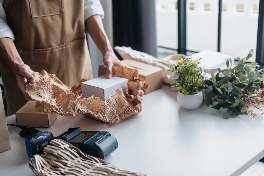 person using sustainable packaging