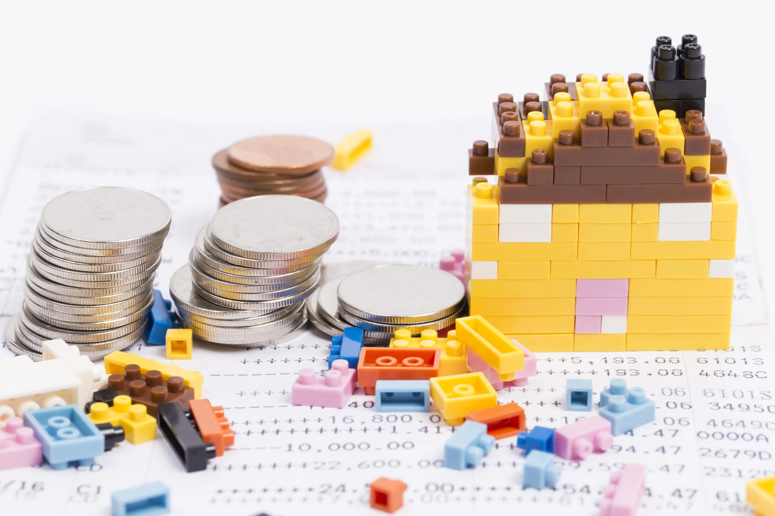 lego house next to coins