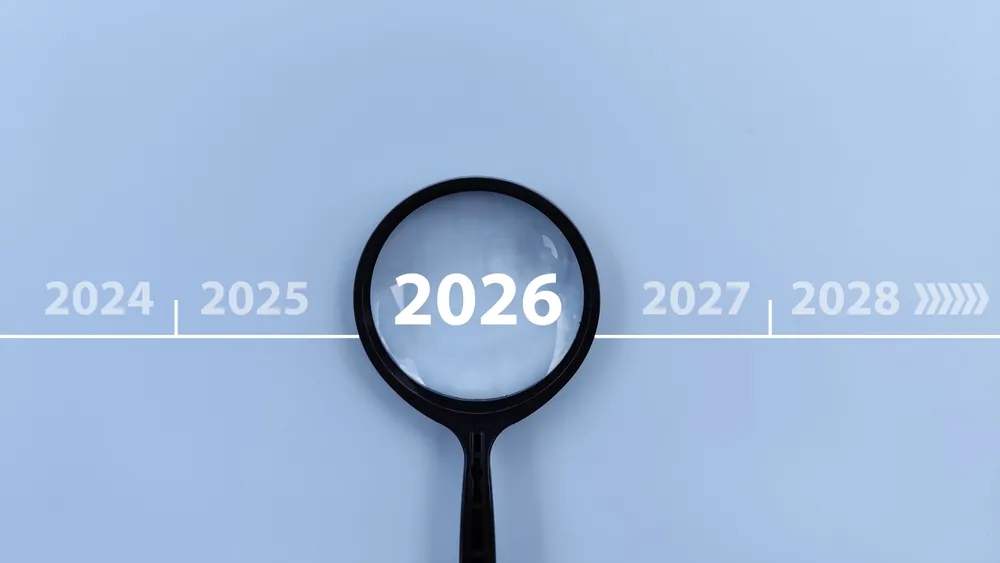 magnifying glass over 2026