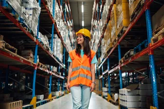 Freight Minimalism COMP worker walking in warehouse