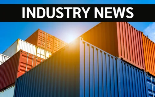 stacked container ships in a shipping year