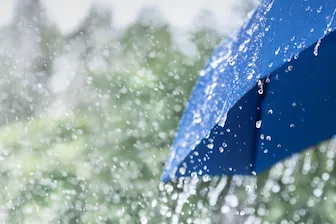 How Does Weather Affect Your Freight rain falling with blue umbrella