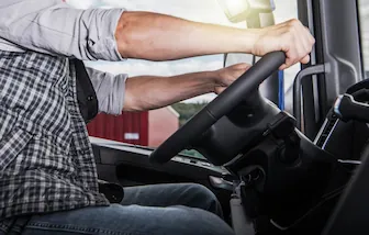 Remote CDL RESIZ truck driver behind the wheel