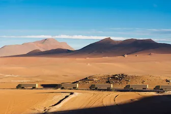 Logistics Behind Secure Freight SM RESIZ secure freight trucks in the desert