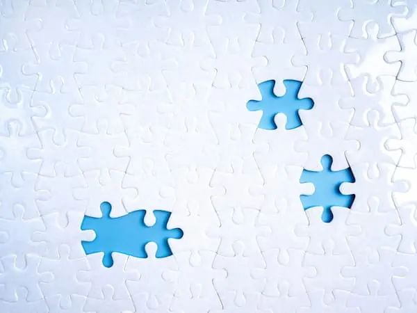 Seasonal Hiring Models puzzle pieces missing from a white blank puzzle