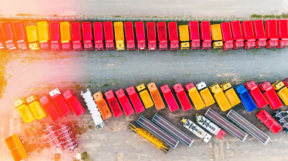 Try Before You Buy aerial topdown view of semi trailers parked in a distribution center's parking lot