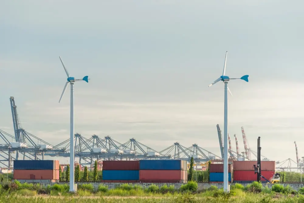 Clean Energy Logistics wind turbines in front of a port